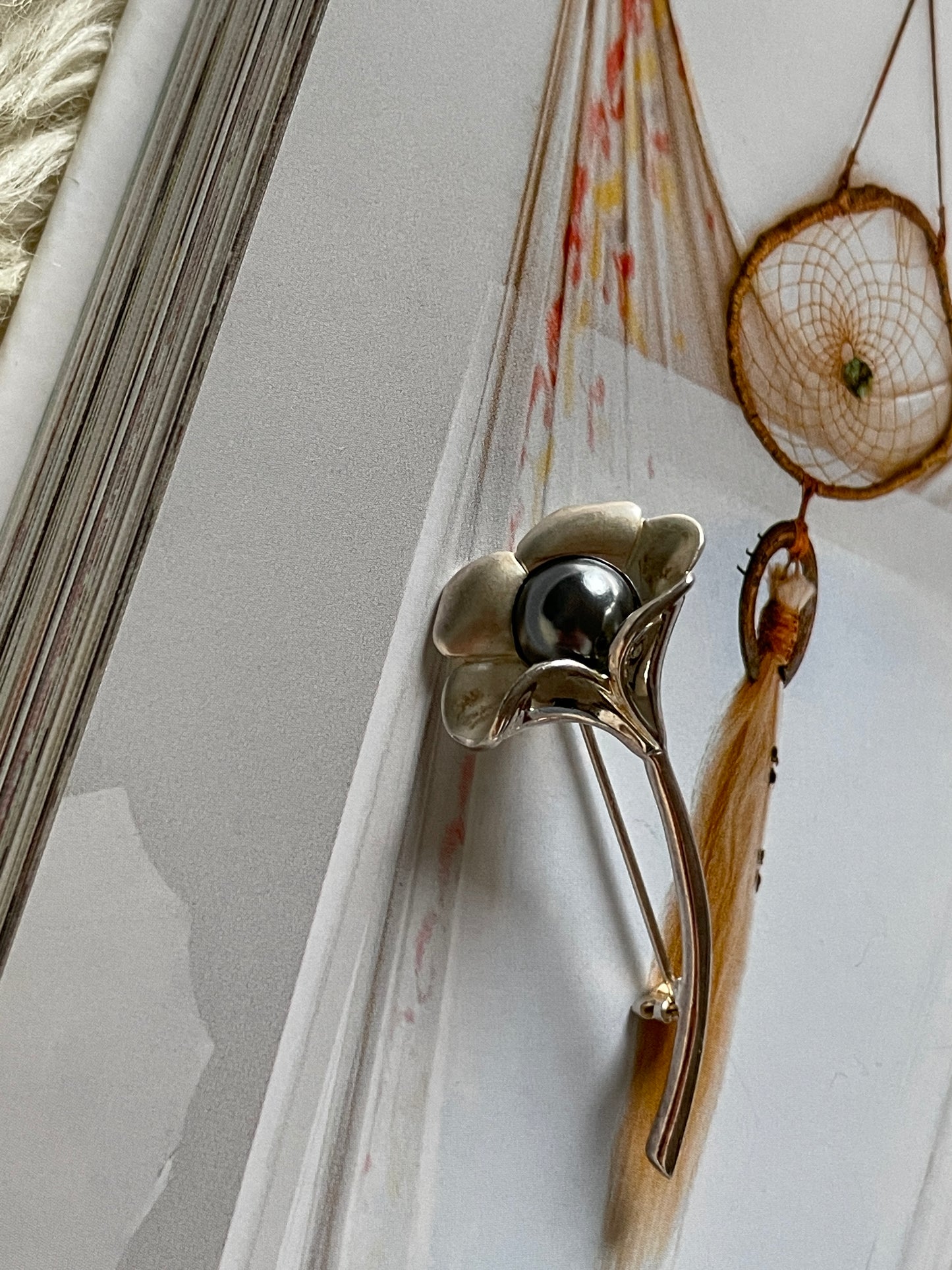 Silver flower brooch