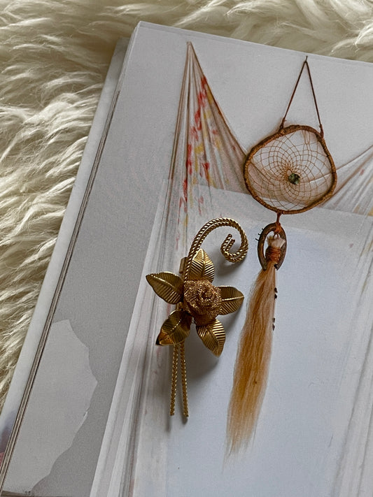 Golden rose brooch