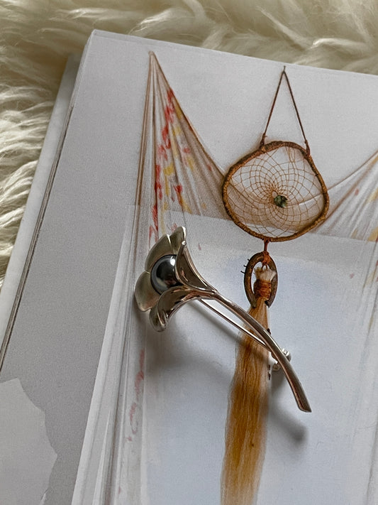 Silver flower brooch